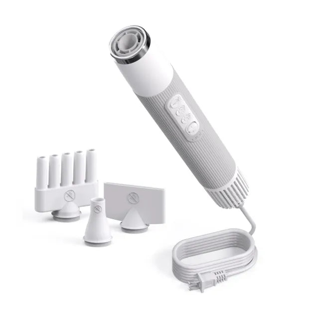 Portable dog dryer with multiple grooming nozzle attachments